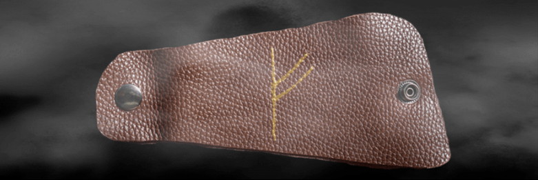 Rune Fehu sur la peau comme amulette porte-bonheur